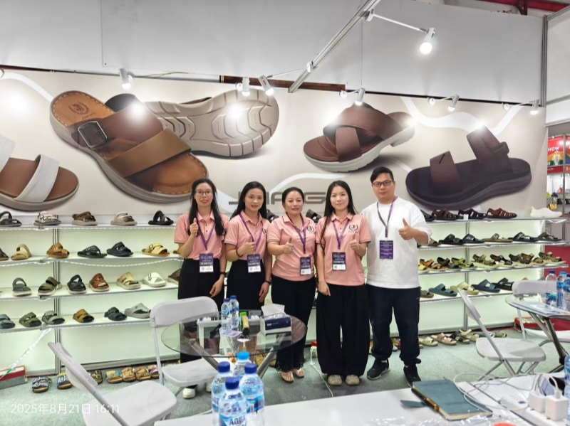 JIJIA.GZ staff giving thumbs-up at Asia Fashion Thailand 2026 footwear booth