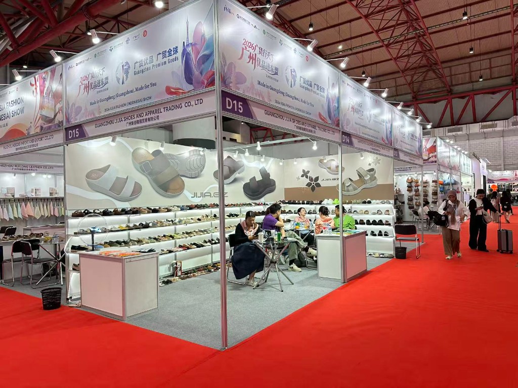 JIJIA.GZ booth D15 at 2026 Asia Fashion Indonesia Show in Jakarta with footwear sample walls