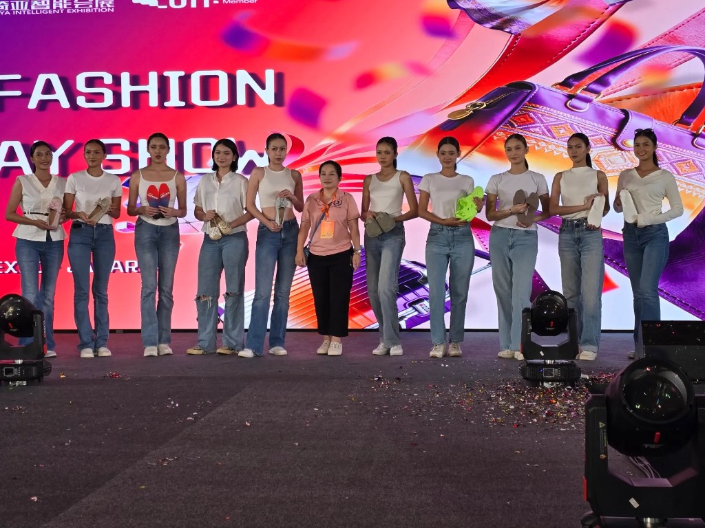 Models presenting JIJIA footwear samples on stage at Asia Fashion Indonesia 2026 fashion show