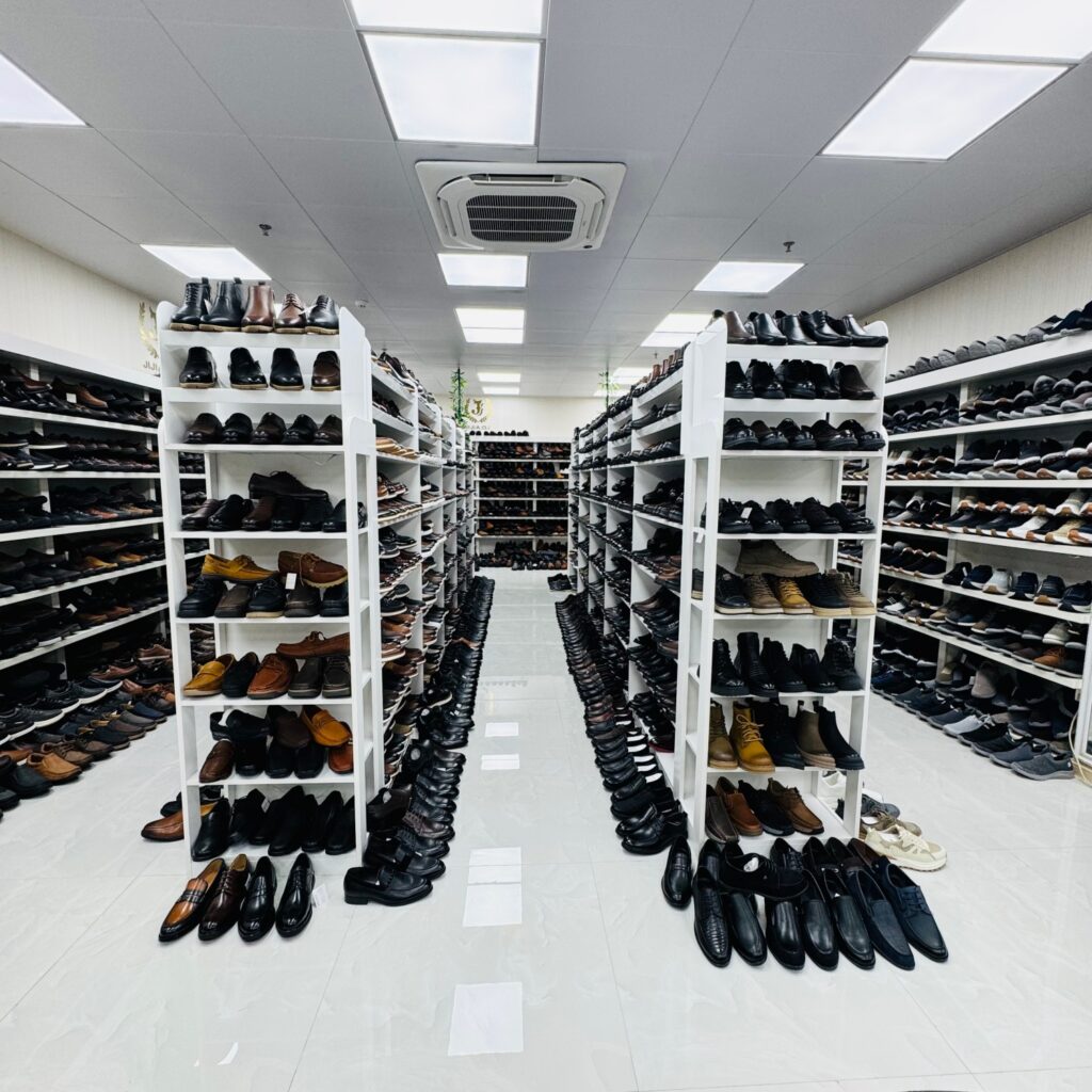 OEM vs ODM vs private label footwear — sample room in a Guangzhou shoe factory